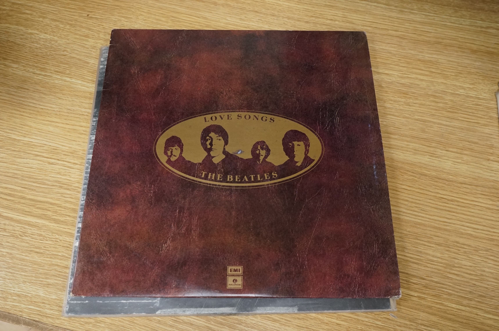 Seven The Beatles LP record albums including; Rubber Soul, two copies of Revolver, The Beatles Vol.1 - Chilean pressing, Love Songs, John Lennon; Rock ‘n’ Roll, Paul McCartney RAM - Chilean pressing.